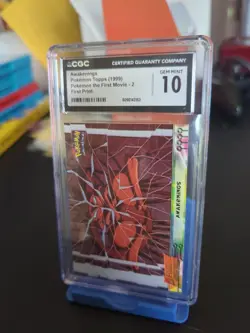 CGC 10 Pokemon Topps The First Movie - Awakenings #2 First Print (Mewtwo) - Image 1