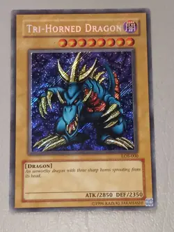 Yugioh Tri-Horned Dragon LOB-000 Secret Rare Unlimited Edition LP - Image 1