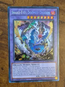 Snake-Eyes Doomed Dragon Secret Rare SUDA-EN035 Near Mint 1st Ed Yu-Gi-Oh! - Image 1