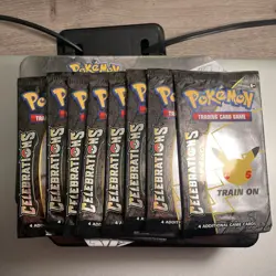 Pokemon TCG 25th Anniversary Celebrations Booster Pack + EXTRAS (10 COUNT TOTAL) - Image 1