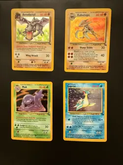 4 NEAR MINT POKEMON FOSSIL MIXED COLLECTION (AERODACTYL, KABUTOPS, MUK, LAPRAS) - Image 2