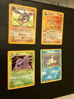 4 NEAR MINT POKEMON FOSSIL MIXED COLLECTION (AERODACTYL, KABUTOPS, MUK, LAPRAS) - Image 3