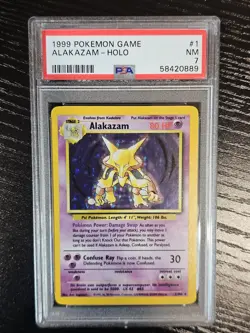 1999 Pokemon Alakazam Base Set Holo Card #1/102 Rare PSA 7 - Image 1