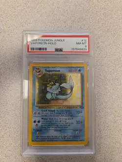 1999 POKEMON JUNGLE #12 VAPOREON-HOLO PSA 8 - Image 1