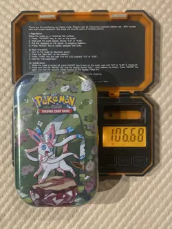 106.68 EXTRA HEAVY! Pokemon Prismatic Evolutions Mini Tin - Possible GOD PACKU - Image 1