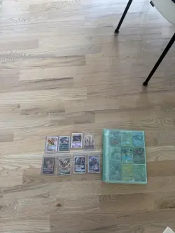 Pokemon TCG Mixed Card Lot with Charizard Cards, Binder, English Standard Size - Image 1