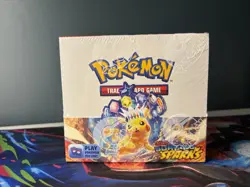 Pokemon TCG Surging Sparks Booster Box Sealed with Small Tear - Image 1