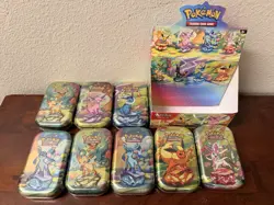 Pokemon TCG: Prismatic Evolutions Full Set Of 8 Sealed Mini Tins With Display - Image 2