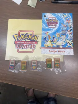 Pokemon TCG League Deck Badge Book And 5 Different Pins - Image 1