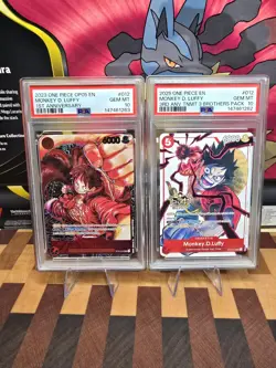 One Piece ST01-012 Luffy OP05 1st Anniv. W/ 3rd Anniv Parallel PSA 10 - Image 1