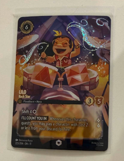 Disney Lorcana Winterspell Lilo Rock Star Enchanted 223/204 - Image 1