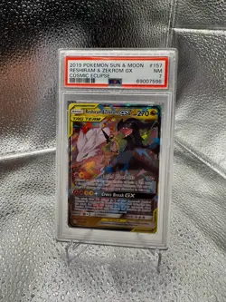 Reshiram & Zekrom Gx Pokemon Sun & Moon Cosmic Eclipse 157 NM PSA 7 - Image 1