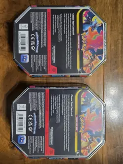 Pokemon TCG: Mega Charizard X & Mega Charizard Y Tin Set Of 2 - Image 3