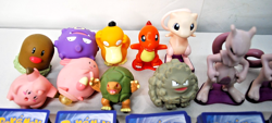 HUNDREDS OF UNSORTED COLLECTABLE POKEMON CARDS AND MISC POKEMON ITEMS - Image 2