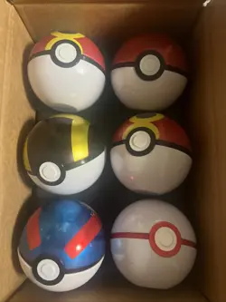 Lot of 6 Empty Pokemon Poke Ball metal collectible tins in assorted styles - Image 1