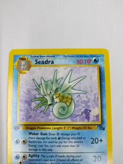 MINT INVEST Pokemon TCG Seadra Fossil, 1st Edition Uncommon Card 42/62 - Image 1