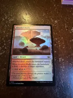 Abraded Bluffs Outlaws of Thunder Junction Foil - Image 1