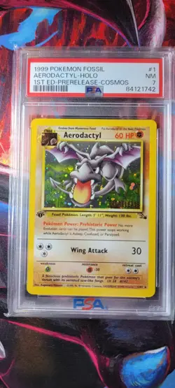 1999 Pokemon Fossil Aerodactyl Holo Prerelease Cosmos PSA 7 - Image 1
