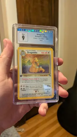 CGC 9 Mint Dragonite 4/62 Fossil 1st Edition POKEMON Holo - Image 1
