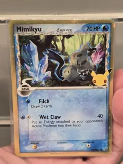 Pokemon TCG Mimikyu Delta Species SWSH136 Black Star Promo Holo Celebrations - Image 1