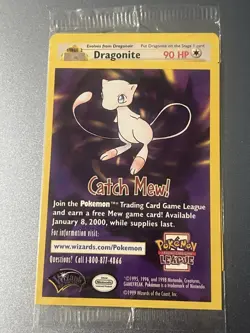 Sealed Catch Mew promo (Dragonite) w/ gold Warner Bros stamp. - Image 1