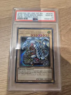 Yu-Gi-Oh Blue-Eyes White Dragon SBCB-EN087 Secret Rare 1st Edition PSA 10 - Image 1