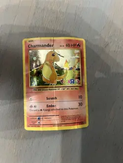 Charmander 9/108 Toys"R"Us PROMO CARD 20th Anniv GEN DAMAGED - Image 1
