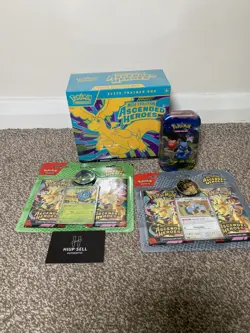 Pokemon TCG: Mega Evolution—Ascended Heroes Rip Sealed ETB + Tin + 2 Blister - Image 1
