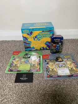Pokemon TCG: Mega Evolution—Ascended Heroes Rip Sealed ETB + Tin + 2 Blister - Image 3