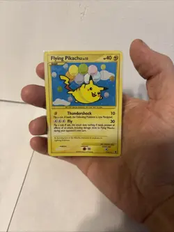 Pokemon TCG Flying Pikachu Holo Card 113/111 Rising Rivals Series - Image 1