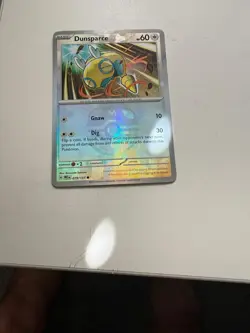 Dunsparce 079/131 C Prismatic Evolutions Pokemon NM MASTERBALL HOLO - Image 1
