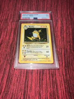 Pokemon 1999 Raichu Holo #14 PSA NM 7 - Image 1