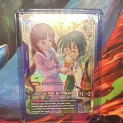 Gundam Card Game Garrod Ran & Tiffa Adill Foil Burst Pilot Card English - Image 1