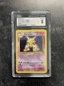 CGC 8 Base Set Alakazam Pokemon Card 1/102 Holo Rare 1999 - Image 1