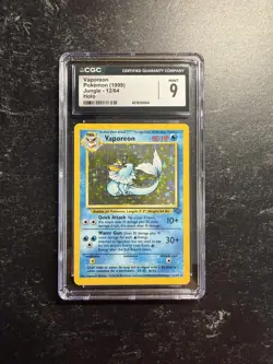 CGC 9 MINT Vaporeon 1999 Jungle 12/64 Holo Rare Pokemon Card - Image 1