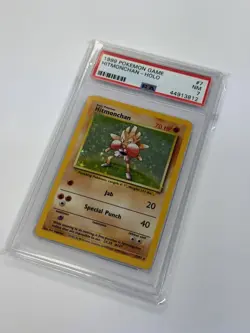Hitmonchan 7/102 (PSA 7) Holo Rare [Base Set] Unlimited Pokemon TCG - Image 1