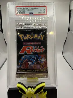 WOTC 2000 Pokemon Team Rocket Foil Booster Pack Gyarados PSA 8 - Image 1