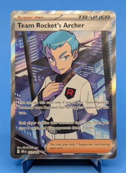 Team Rocket’s Archer 223/182 Pokemon TCG 2023 Ultra Rare Full‑Art Holo DRI NM - Image 1