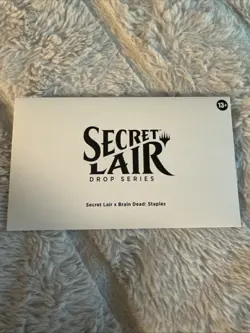 Secret Lair: Drop Series - Secret Lair x Brain Dead (Staples) Foil - Image 1