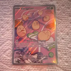 Pokemon Exeggcute Holo Illustration Rare SV08 Surging Sparks 192/191 Plant Card - Image 1