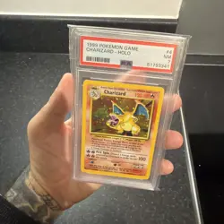 1999 Pokemon Game Charizard Holo #4 Base Set PSA 7 Nm 132878972 - Image 1