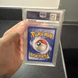1999 Pokemon Game Charizard Holo #4 Base Set PSA 7 Nm 132878972 - Image 2