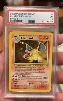 1999 POKEMON BASE SET UNLIMITED #4 CHARIZARD-HOLO Base 2 PSA 7 Near Mint - Image 1
