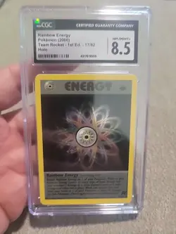 Pokemon Rainbow Energy Team Rocket 1st Edition Holo Rare #17 CGC 8.5 - Image 1