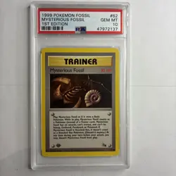 1999 Pokemon Fossil #62 Mysterious Fossil 1st Edition PSA 10 - Image 1