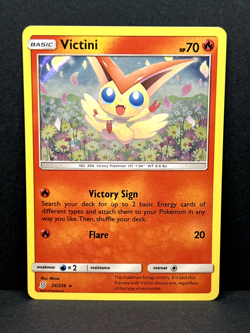 Victini Holo 26/236 - Pokemon TCG Card Unified Minds Rare - NM/LP - Image 1