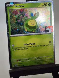 Budew 004/131 Cosmos Holo Pokemon Play! Prize Pack Series 8 Play Stamp - Image 1