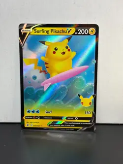 Pokemon TCG Surfing Pikachu v Celebrations Holo Ultra Rare Card 008/025 - Image 1