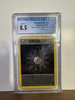 Rainbow Energy Pokemon 2000 Team Rocket 1st Edition 17/82 Holo CGC 8.5 - Image 1