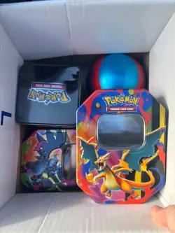 4 Pokemon Mystery Tins filled with Pokemon, One Piece, Lorcana, and more TCG! - Image 1